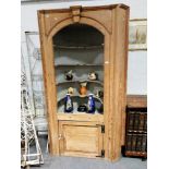 A large pine corner cupboard, late 19th century