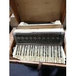 Italian accordion, in a pine case.
