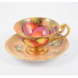 A Royal Worcester cup and saucer, hand painted fruit design signed E Townsend.