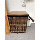 Victorian oak revolving library bookcase, containing Encyclopaedia Britannica 9th Edition.