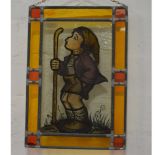 Small stained glass window depicting a whistling boy