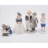 Four Royal Copenhagen figures of children - young girl in long dress 1251 20cm,