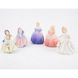 A collection of Royal Doulton figurines depicting girls (9)