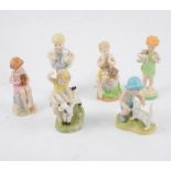 A collection of Royal Worcester Days Of The Week/ Months Of The Year figurines (14)