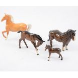 Six Beswick and Melba ware horses, a Wade Beneagles decanter and Wade tortoise and trough. (11)