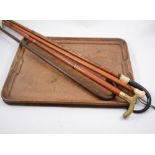 Walking cane with ivory pommel; pair of walking sticks; oak tray; carved oak frames; coffer-shape