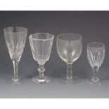 A large collection of table glassware.