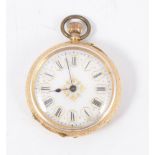 A yellow metal open face fob watch, white enamel dial with a roman numeral chapter ring in a yellow