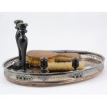Silver plated galleried tray with two pairs of ebony candlesticks and a brush set