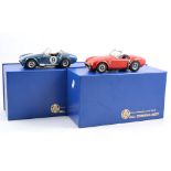 Those Classic Lines metal model CL3 AC Cobra 427 in red and another with racing number no.9, aprox