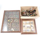 A quantity of white metal military war gaming figures, in two display cases, and a selection of