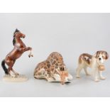 A collection of Beswick and other china horses and animals, including Beswick black and white horse,