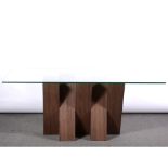 Contemporary glass topped dining table.