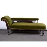 A Victorian chaise longue upholstered in green velvet,