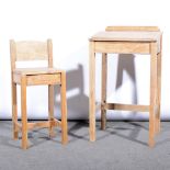 Oak child's desk and chair, the desk with sloping writing surface, height 80cm, the chair with box