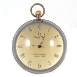 A globe pendant desk clock signed Omega, 9cm.