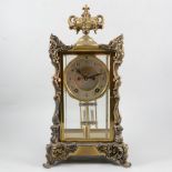 French style American four glass mantel clock, cast urn finial, silvered dial with visible