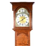 Reproduction oak longcase clock, arched brass dial with silvered chapter ring, German weight driven