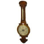 A Victorian walnut banjo shape barometer, silvered dial signed A Molteni, 3 Eyre Street, Hill,