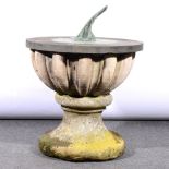 Victorian sundial, within a circular slate surrround on a stone fluted campana stand, diameter 54cm.