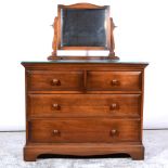 Ercol stained wood chest of drawers, and a matching toilet mirror.