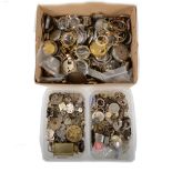 Assorted watchmaker's case and movement parts.