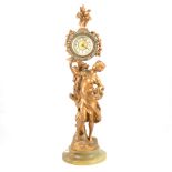 A French style figural clock with paste bezel to dial.