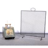 Victorian brass mounted painted tin slope front coal box, width 29cm; and a metal firescreen, (2).