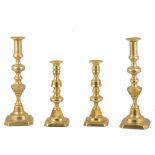 Pair of Victorian turned brass candlesticks, 23cm, and other candlesticks, etc.