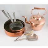Two copper kettles, oval 23cm, round 32cm, horse brasses, a set of three copper saucepans diameter