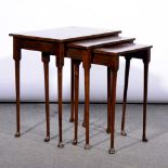 Nest of three walnut occasional tables