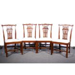 Set of six Chippendale style stained wood dining chairs.