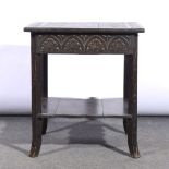 Carved oak centre table.