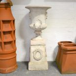 Concrete campana shaped garden urn,