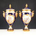 Pair of Coalport urn shaped covered vases, Westminster Abbey and St. Pauls Cathedral.