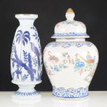 An early 20th Century enamelled glass vase, and a pair of Italian pottery covered vases.