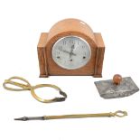 Three ink blotters, glove stretchers, an oak cased Enfield mantel clock and fireside set.