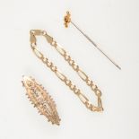 A 9 carat yellow gold figaro link bracelet approximate weight 6gms, small floral sweetheart brooch