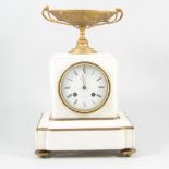 A white marble and gilt metal mantel clock, signed Charles Oudin, Palais Royal, Paris.