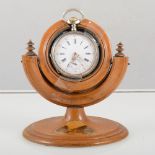 A Mauchline ware pocket watch stand with image of Ashwood Dale, with an open face pocket watch