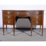 Edwardian mahogany serpentine sideboard.