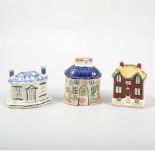 Three Pratt type pottery cottage money boxes.