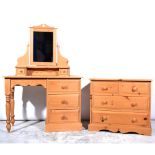 Modern pine dressing table, and a pine chest of drawers.