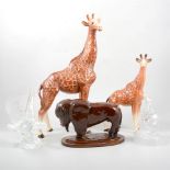 Two Melba ware pottery models of Giraffes, a pottery buffalo, a Waterford Crystal eagle, and a