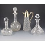 Moulded glass claret jug, electroplate mounts, and various decanters.