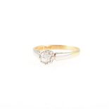 A diamond solitaire ring, the old cut stone illusion set in a yellow and white metal single stone
