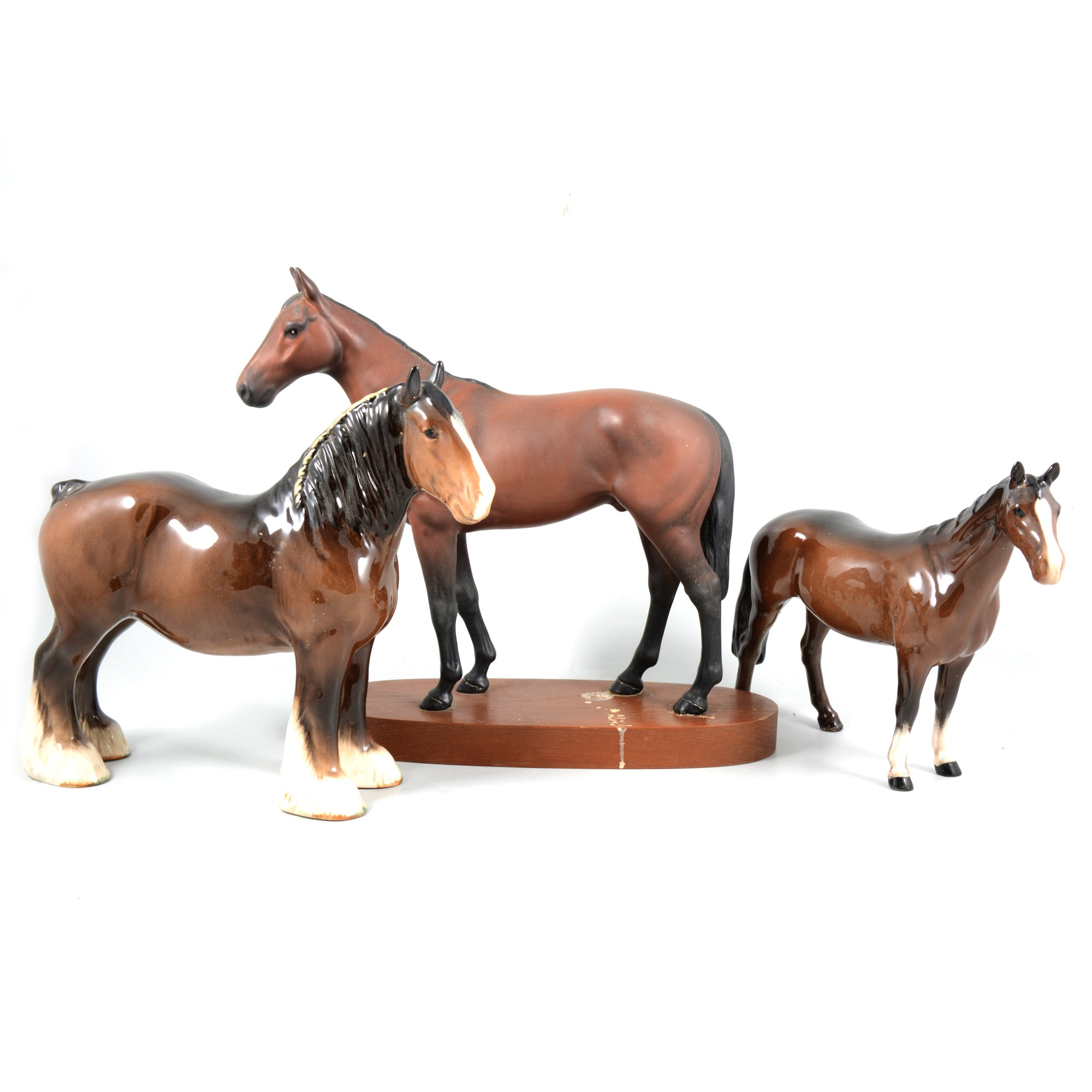 Beswick Connoisseur model, Mill Reef, and two other Beswick horses. (3)