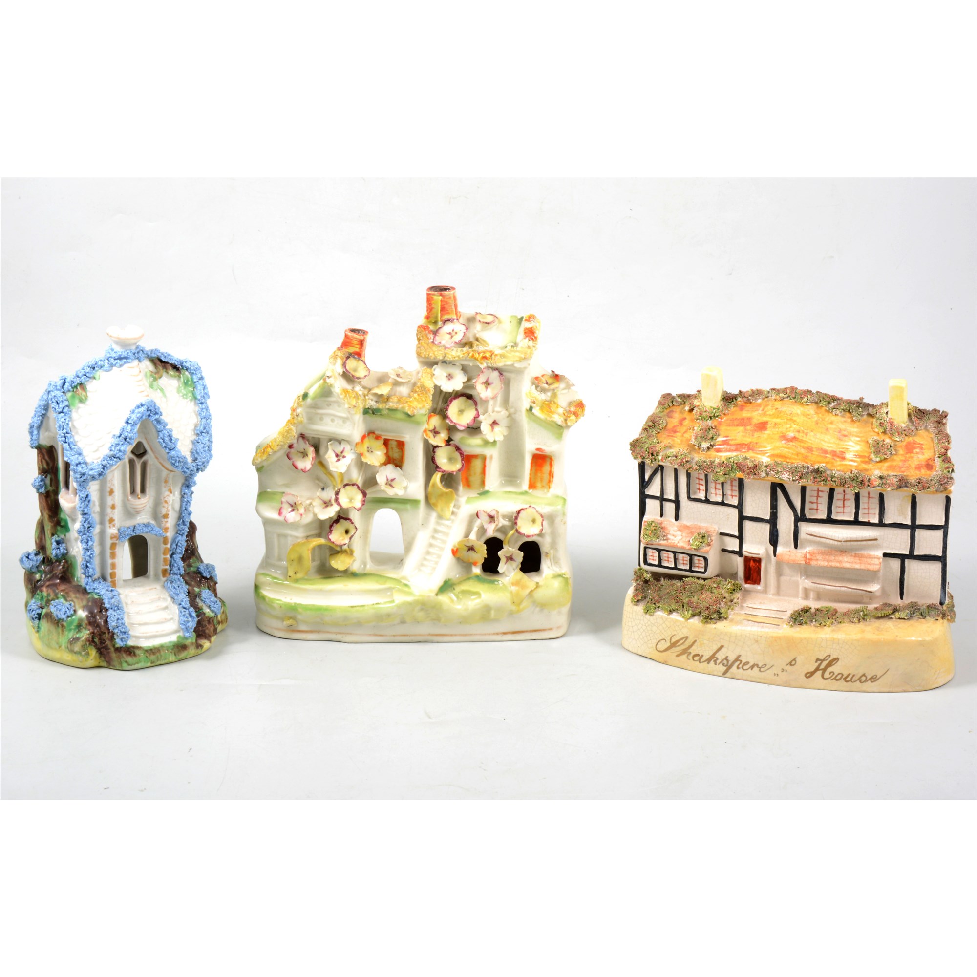 A collection of fifteen Staffordshire 19th Century cottages and pastille burners.