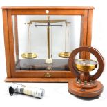 Collection of scientific instruments, including scales by Warren & Tatlock, tape measure etc.