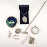 A silver oval locket on a chain with Sheffield import mark, an open face pocket watch with Swiss
